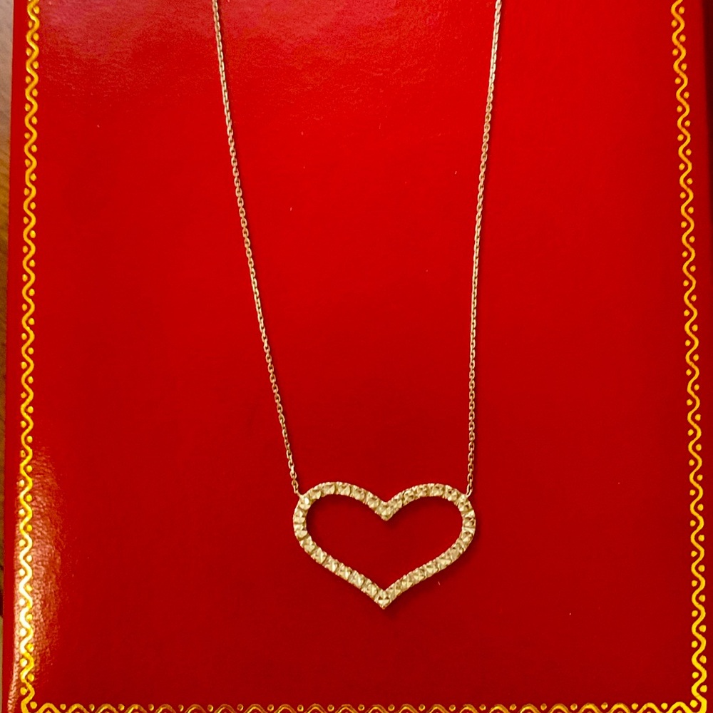 10 Karat white gold open heart diamond cut 16 inch necklace
